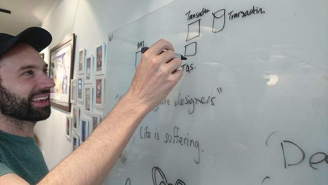 James Cooke at a whiteboard